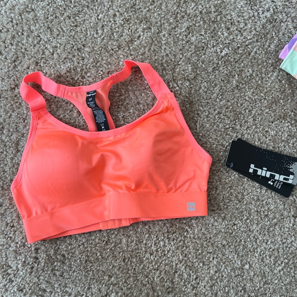 Hot coral sports bra in small.